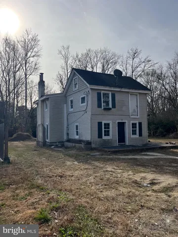a house view with a backyard space