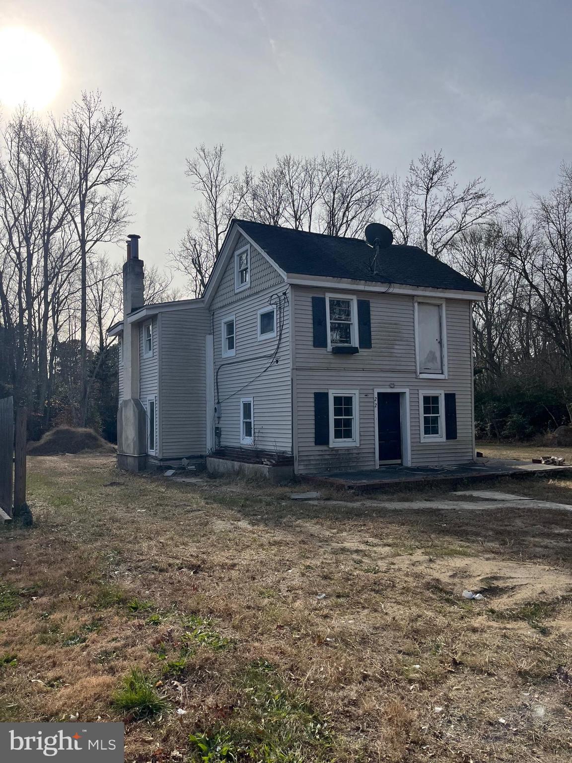 a house view with a backyard space