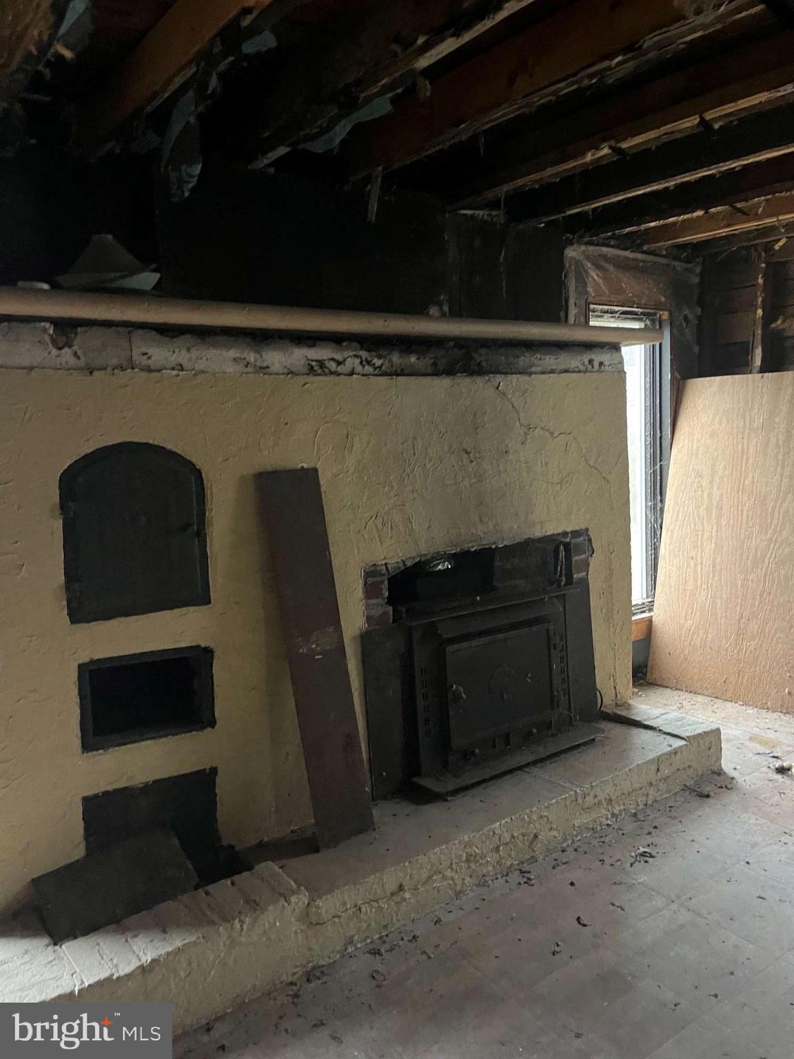 225 Zion Road, Unit 225 Egg Harbor Township, NJ 08234 - Photo 5 of 7 a living room with furniture and a fireplace