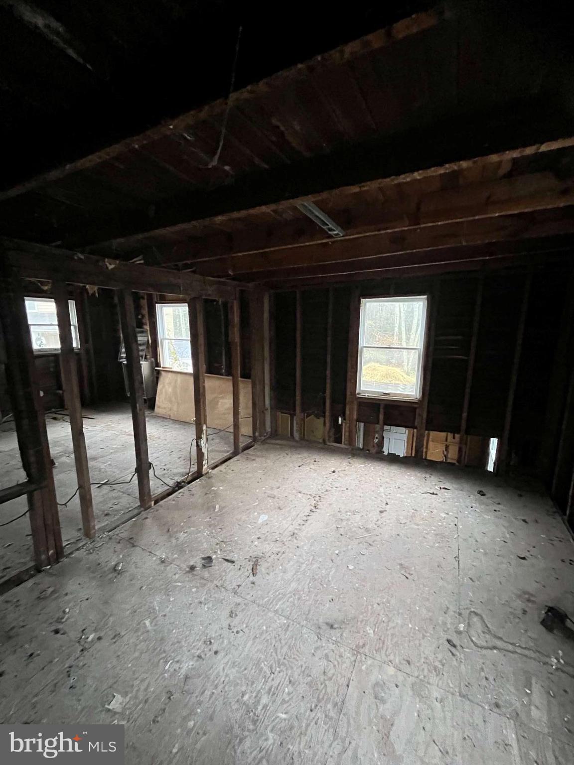 225 Zion Road, Unit 225 Egg Harbor Township, NJ 08234 - Photo 6 of 7 a view of an empty room with windows