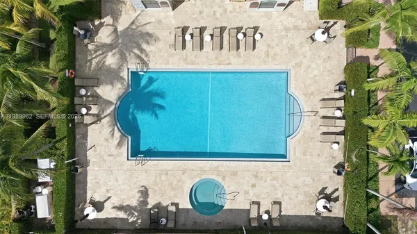 an aerial view of a house with outdoor space