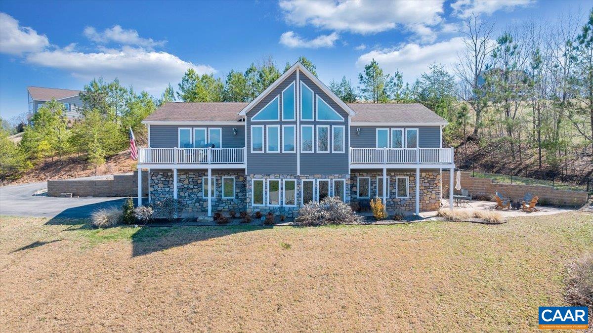 439 Gardner Farm Road Appomattox, VA 24522 - Photo 1 of 73 a front view of a house with yard and trees in the background