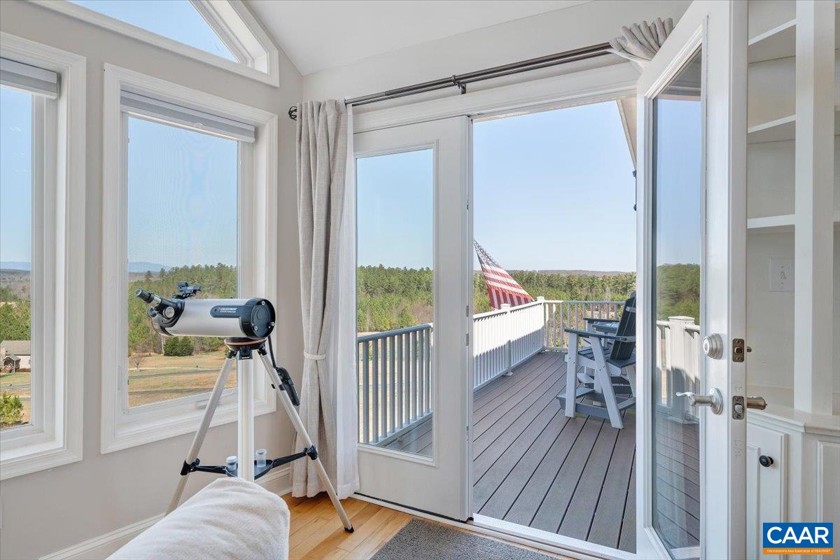 439 Gardner Farm Road Appomattox, VA 24522 - Photo 19 of 73 a view of a room with furniture and floor to ceiling window