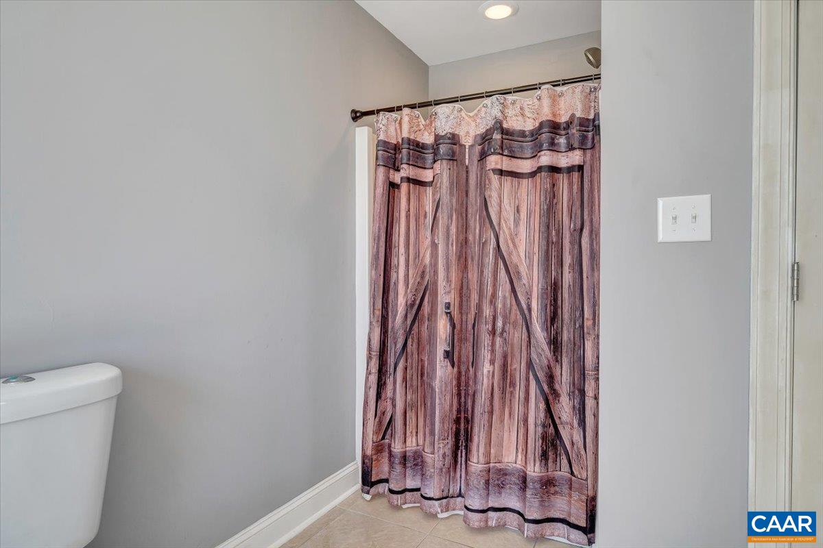 439 Gardner Farm Road Appomattox, VA 24522 - Photo 32 of 73 a view of a room with door and wooden floor
