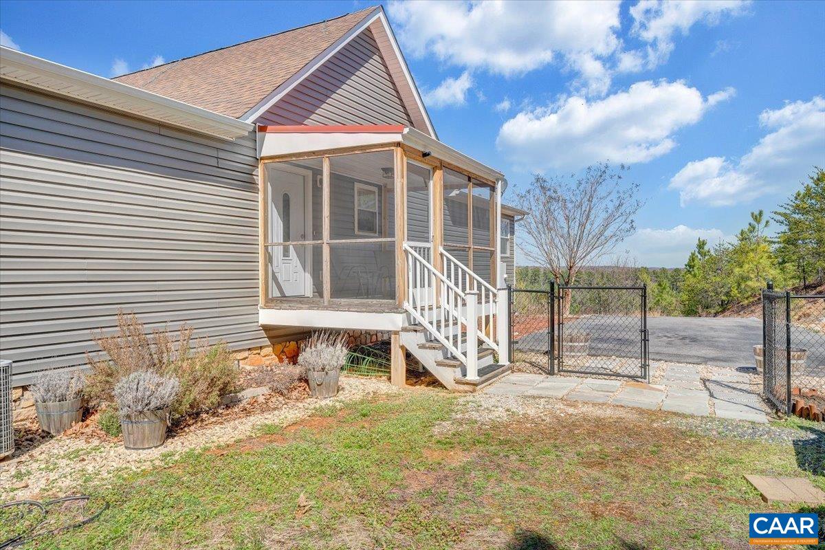 439 Gardner Farm Road Appomattox, VA 24522 - Photo 40 of 73 a view of a house with a yard and wooden fence