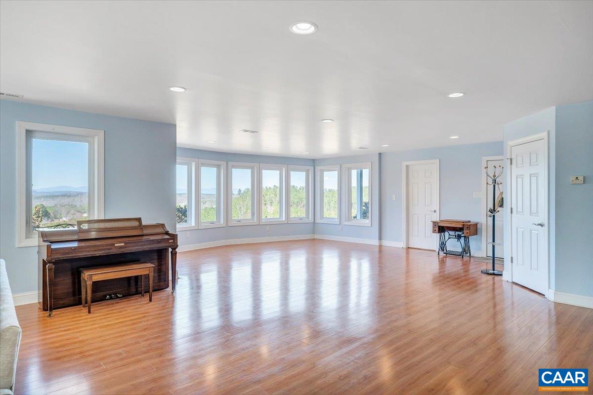 439 Gardner Farm Road Appomattox, VA 24522 - Photo 43 of 73 a view of a living room filled with furniture and wooden floor
