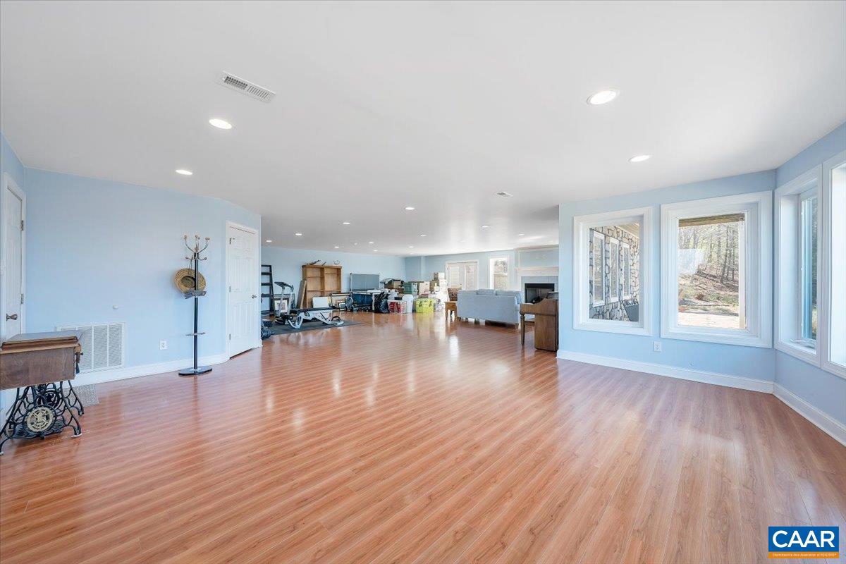 439 Gardner Farm Road Appomattox, VA 24522 - Photo 45 of 73 a view of empty room with kitchen view and a window
