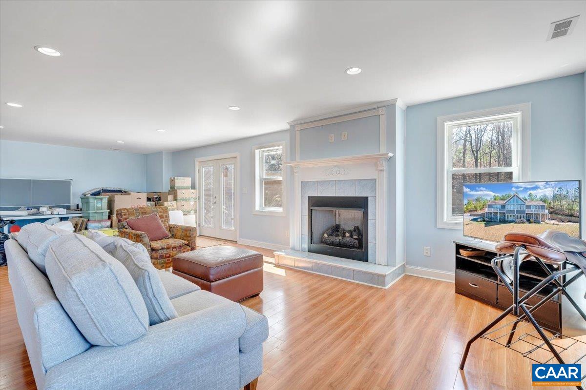 439 Gardner Farm Road Appomattox, VA 24522 - Photo 48 of 73 a living room with furniture and a fireplace