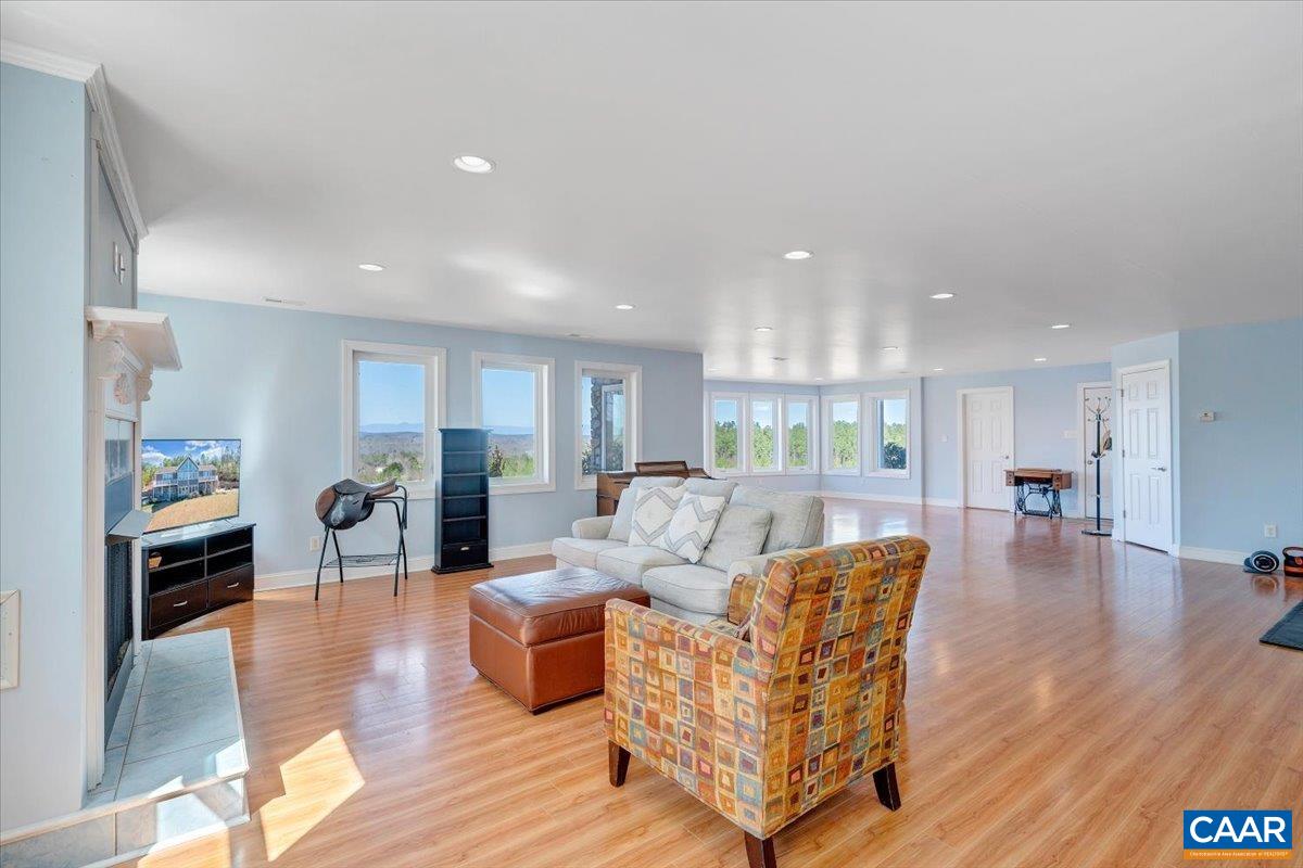 439 Gardner Farm Road Appomattox, VA 24522 - Photo 49 of 73 a living room with furniture and wooden floor