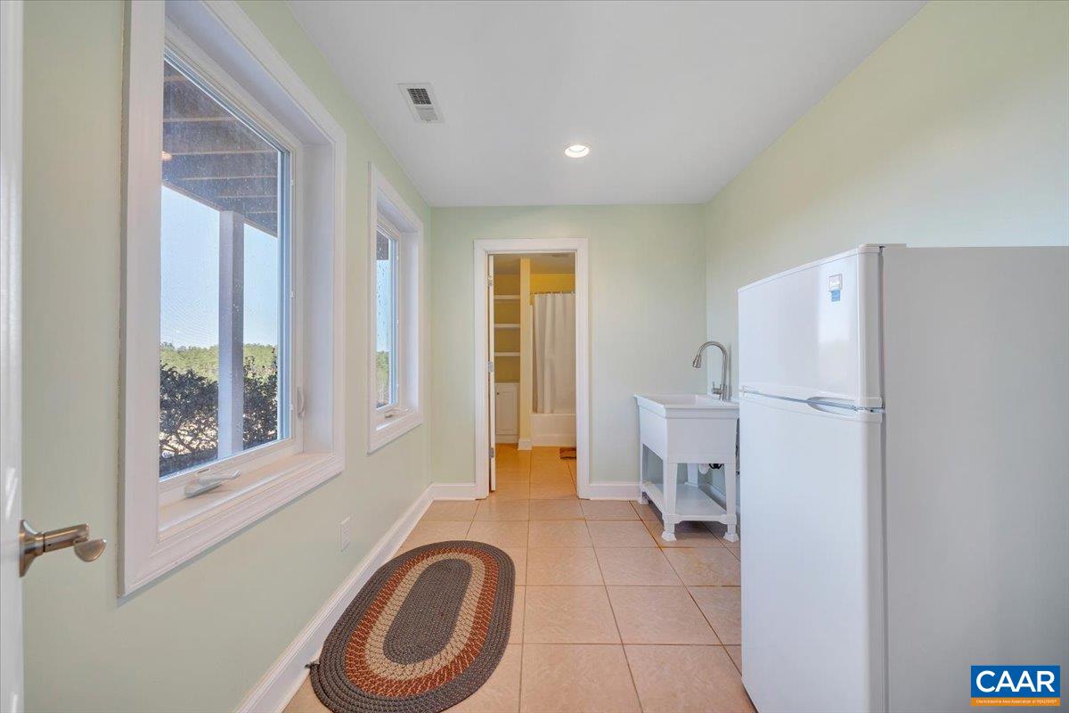 439 Gardner Farm Road Appomattox, VA 24522 - Photo 50 of 73 a bathroom with a sink a toilet and a shower