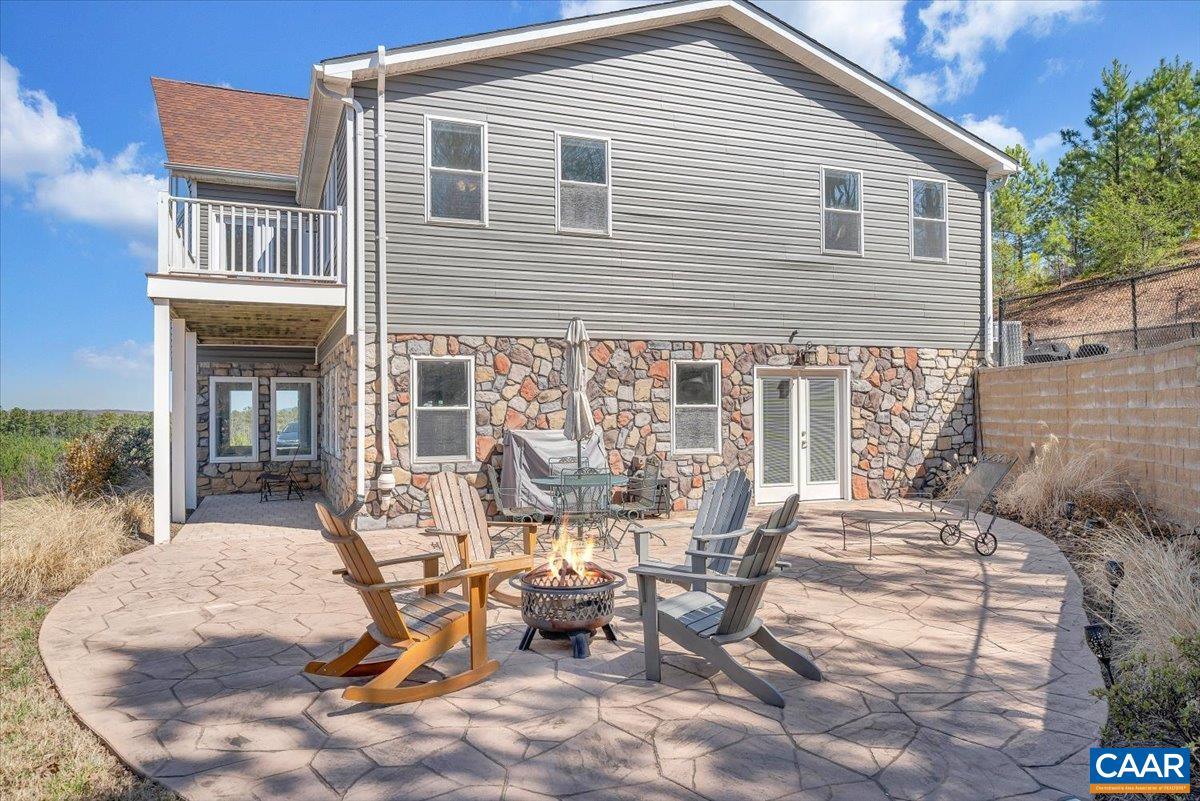 439 Gardner Farm Road Appomattox, VA 24522 - Photo 56 of 73 a view of a house with backyard sitting area and garden