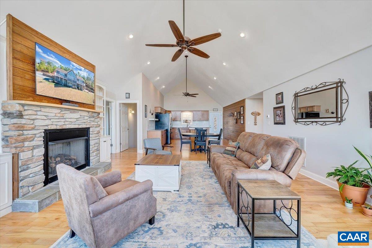 439 Gardner Farm Road Appomattox, VA 24522 - Photo 7 of 73 a living room with furniture and a fireplace