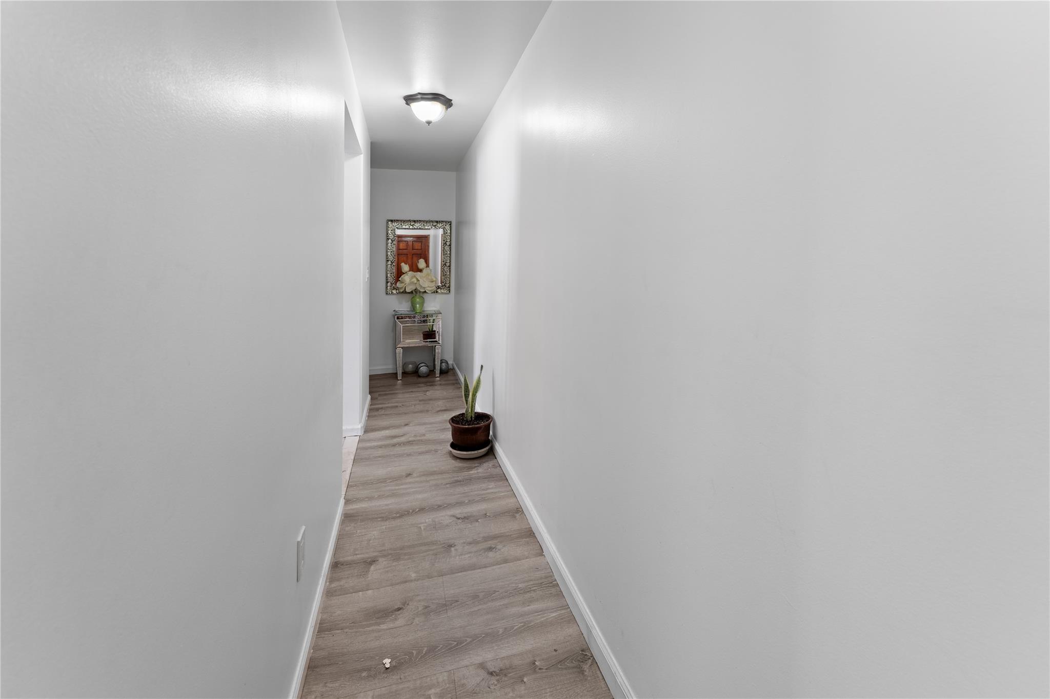 848 Morris Park Avenue Bronx, NY 10462 - Photo 12 of 22 a view of a hallway with wooden floor