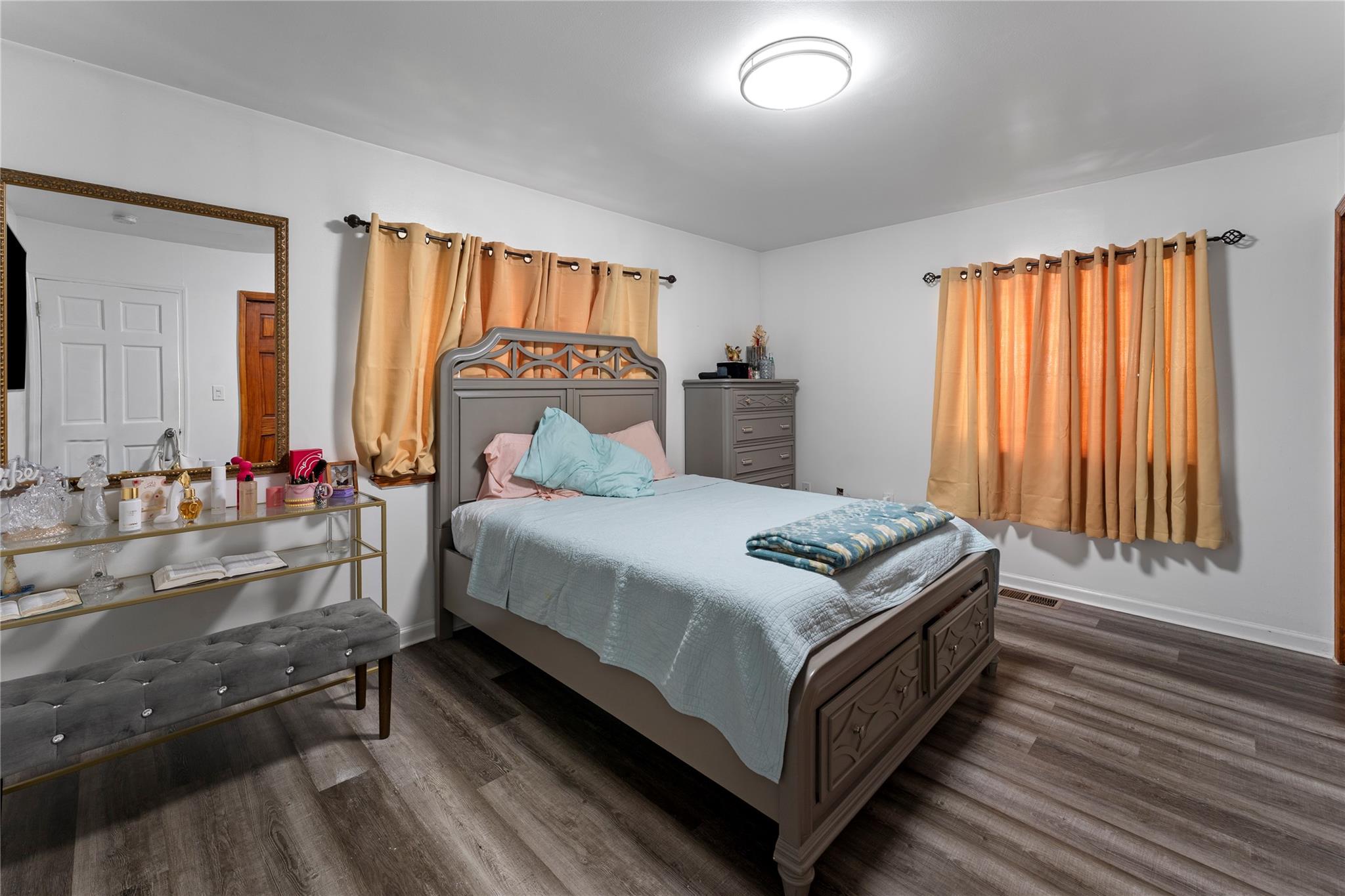 848 Morris Park Avenue Bronx, NY 10462 - Photo 16 of 22 a bedroom with a bed and window