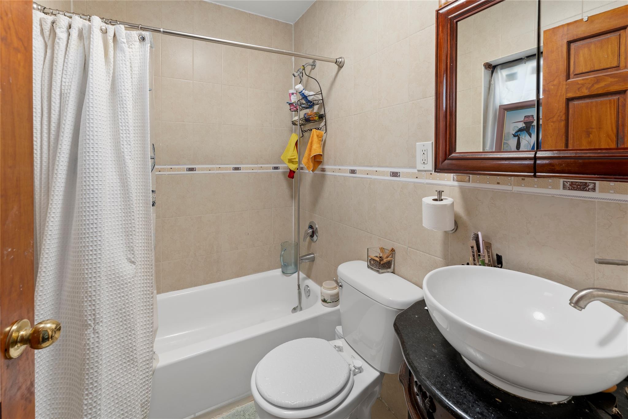 848 Morris Park Avenue Bronx, NY 10462 - Photo 19 of 22 a bathroom with a sink toilet and shower