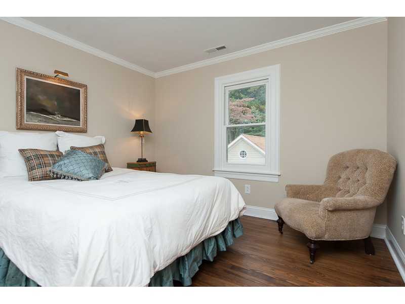 226 Riverside Avenue Riverside, CT 06878 - Photo 11 of 24 a bedroom with a bed and a couch