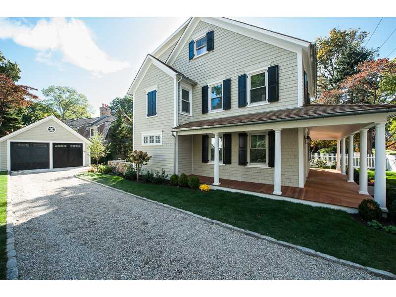 226 Riverside Avenue Riverside, CT 06878 - Photo 17 of 24 a front view of a house with a yard