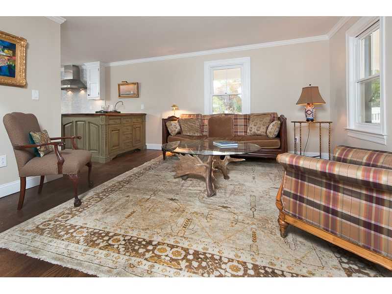226 Riverside Avenue Riverside, CT 06878 - Photo 4 of 24 a living room with furniture and a wooden floor