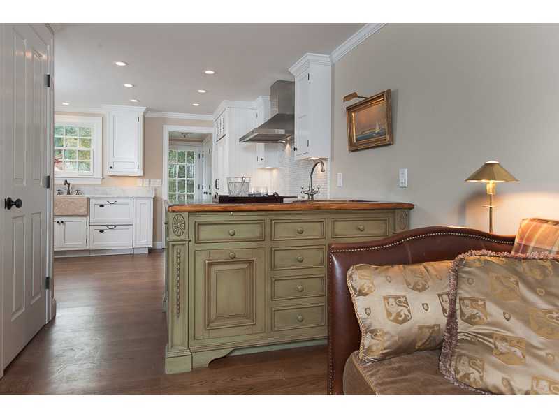 226 Riverside Avenue Riverside, CT 06878 - Photo 5 of 24 a bedroom with a bed and furniture