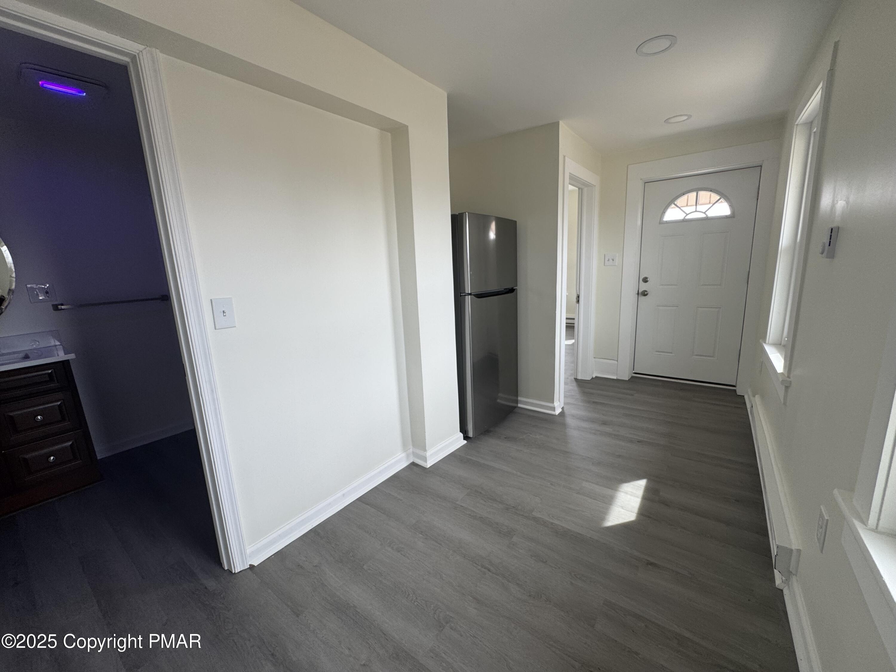 807 Chestnut Street, Unit 2 Coplay, PA 18037 - Photo 5 of 13 a view of a hallway with wooden floor