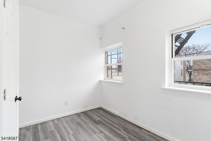 5 Elm Street, Unit 3 Newark, NJ 07102 - Photo 11 of 15 a view of hallway with window