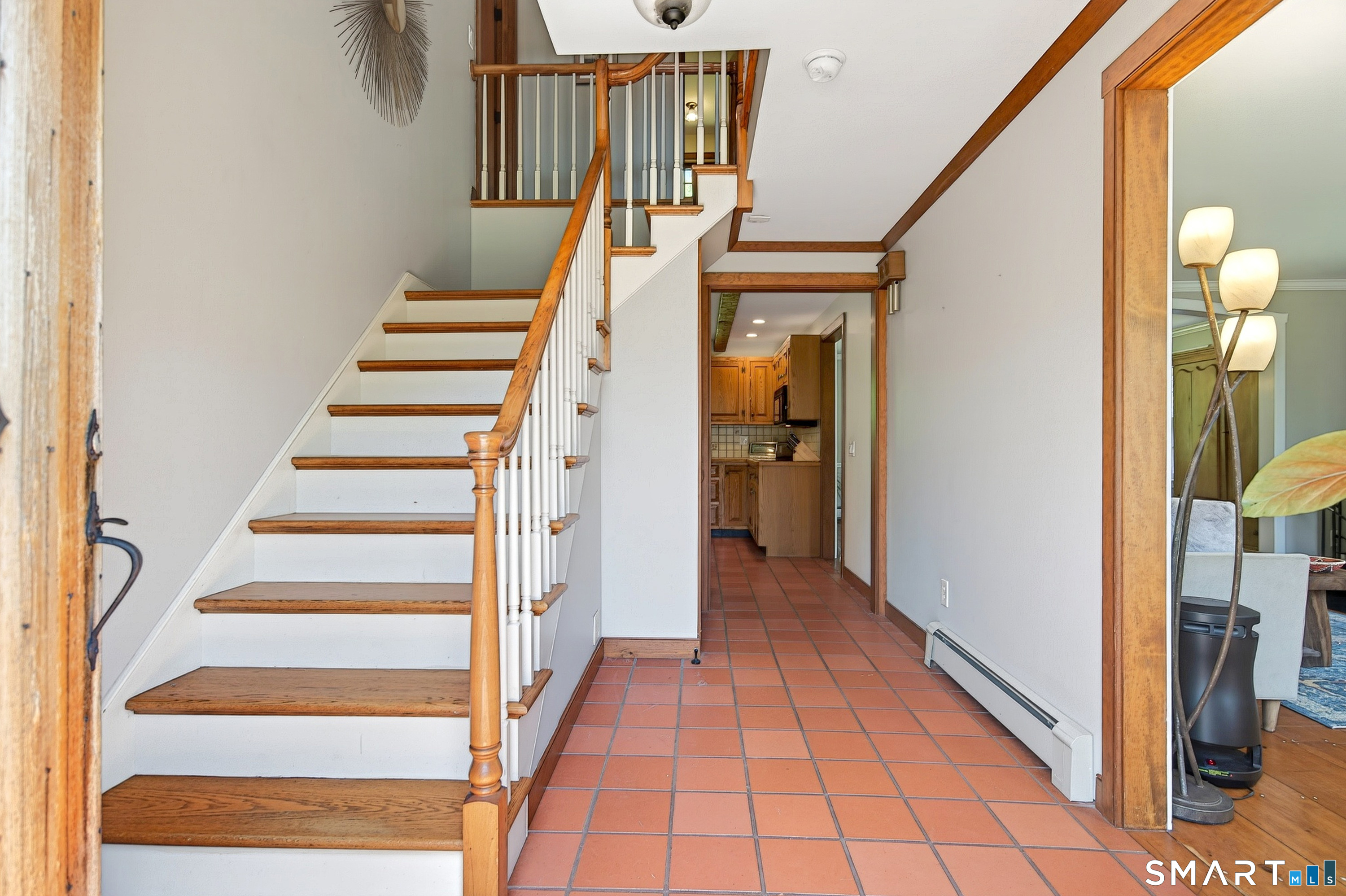 174 Huntingtown Road Newtown, CT 06470 - Photo 3 of 40 a view of entryway and hall with wooden floor