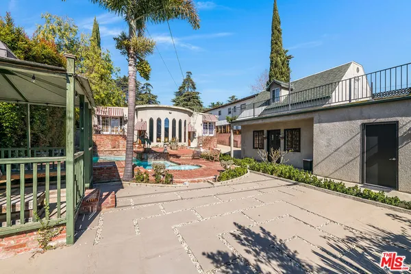 front view of a house with a patio