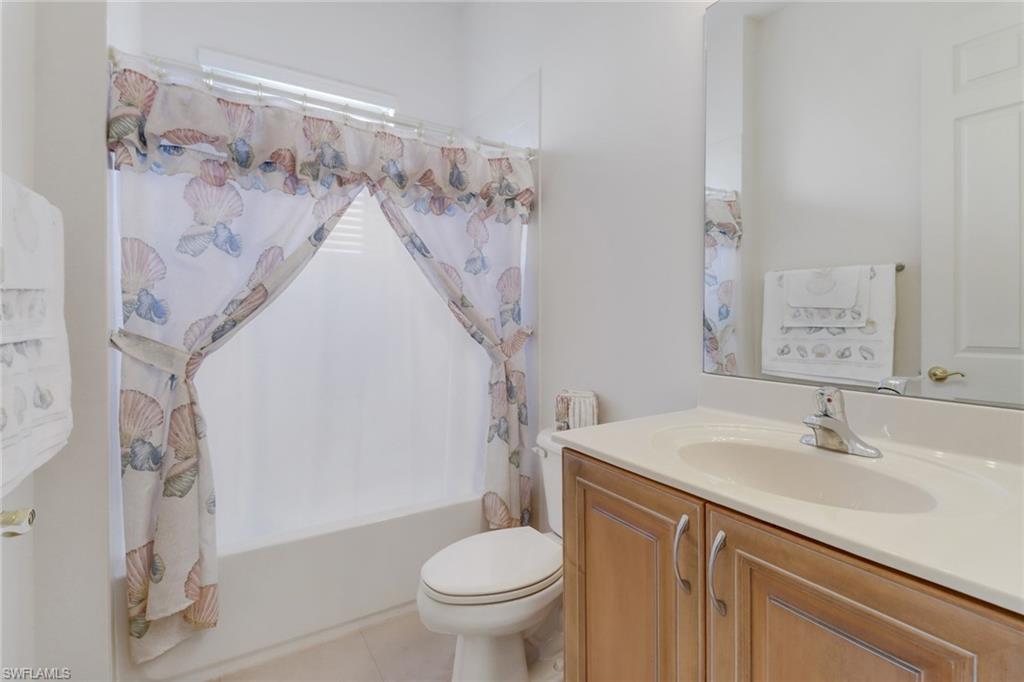 9246 Springview Loop Estero, FL 33928 - Photo 17 of 44 a bathroom with a sink toilet and shower