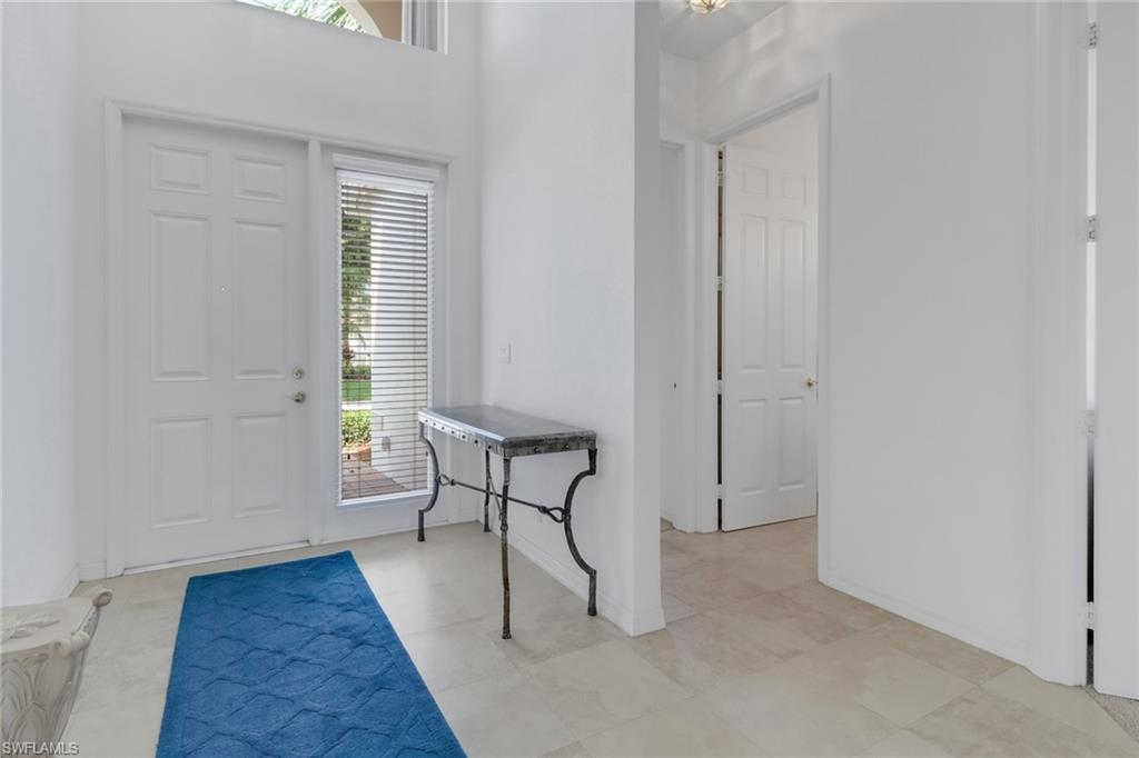 9246 Springview Loop Estero, FL 33928 - Photo 3 of 44 a view of a livingroom with furniture and wooden floor