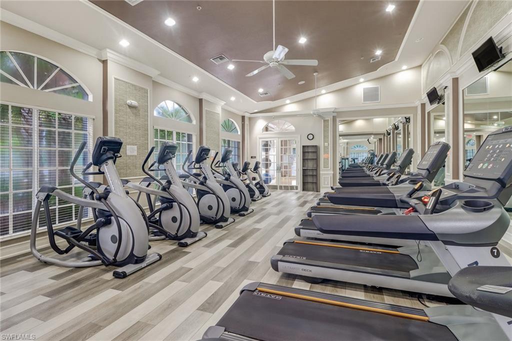 9246 Springview Loop Estero, FL 33928 - Photo 41 of 44 a view of a room with gym equipment