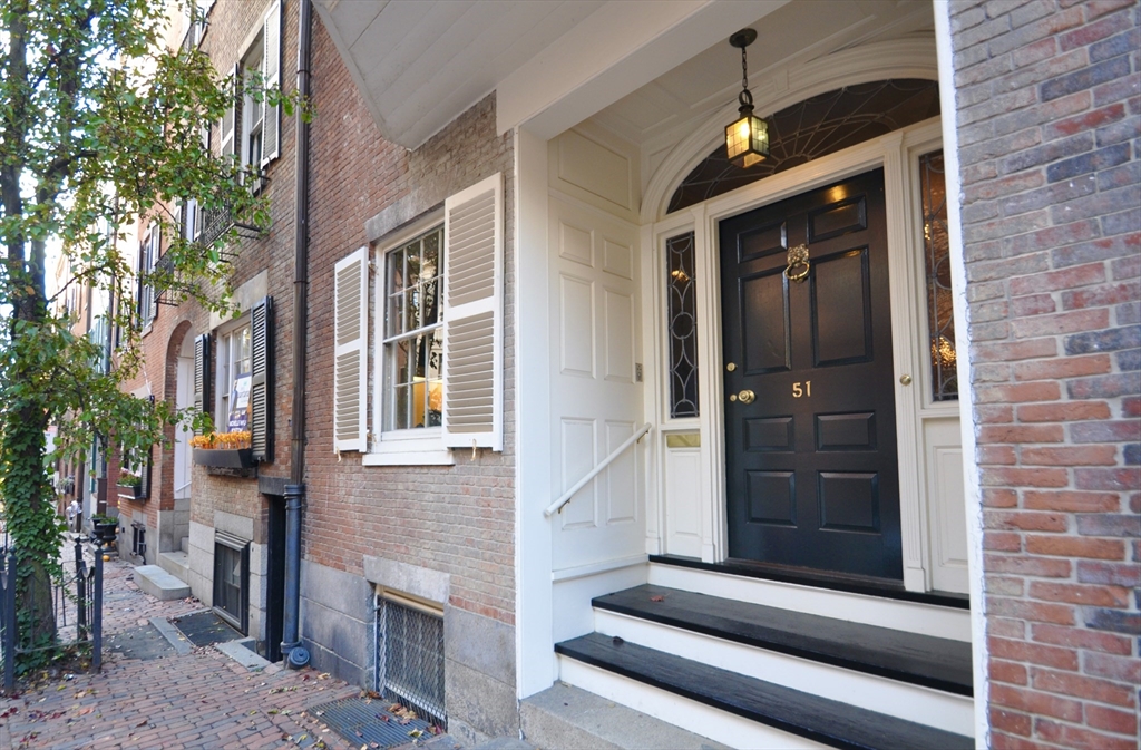 a front view of a house with a entryway