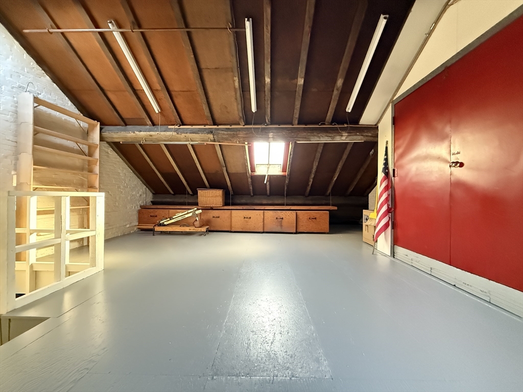 51 Pinckney Street Boston, MA 02114 - Photo 15 of 16 a view of an empty room with windows