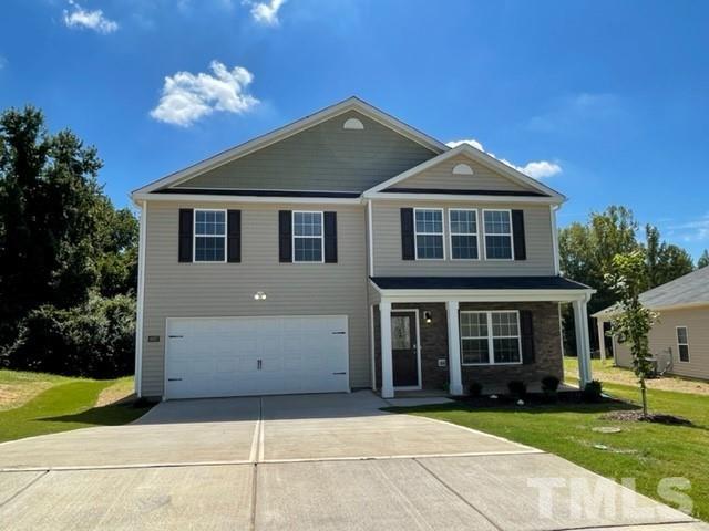 4027 Water Wheel Road Rocky Mount, NC 27803 - Photo 2 of 5 a front view of a house with a yard