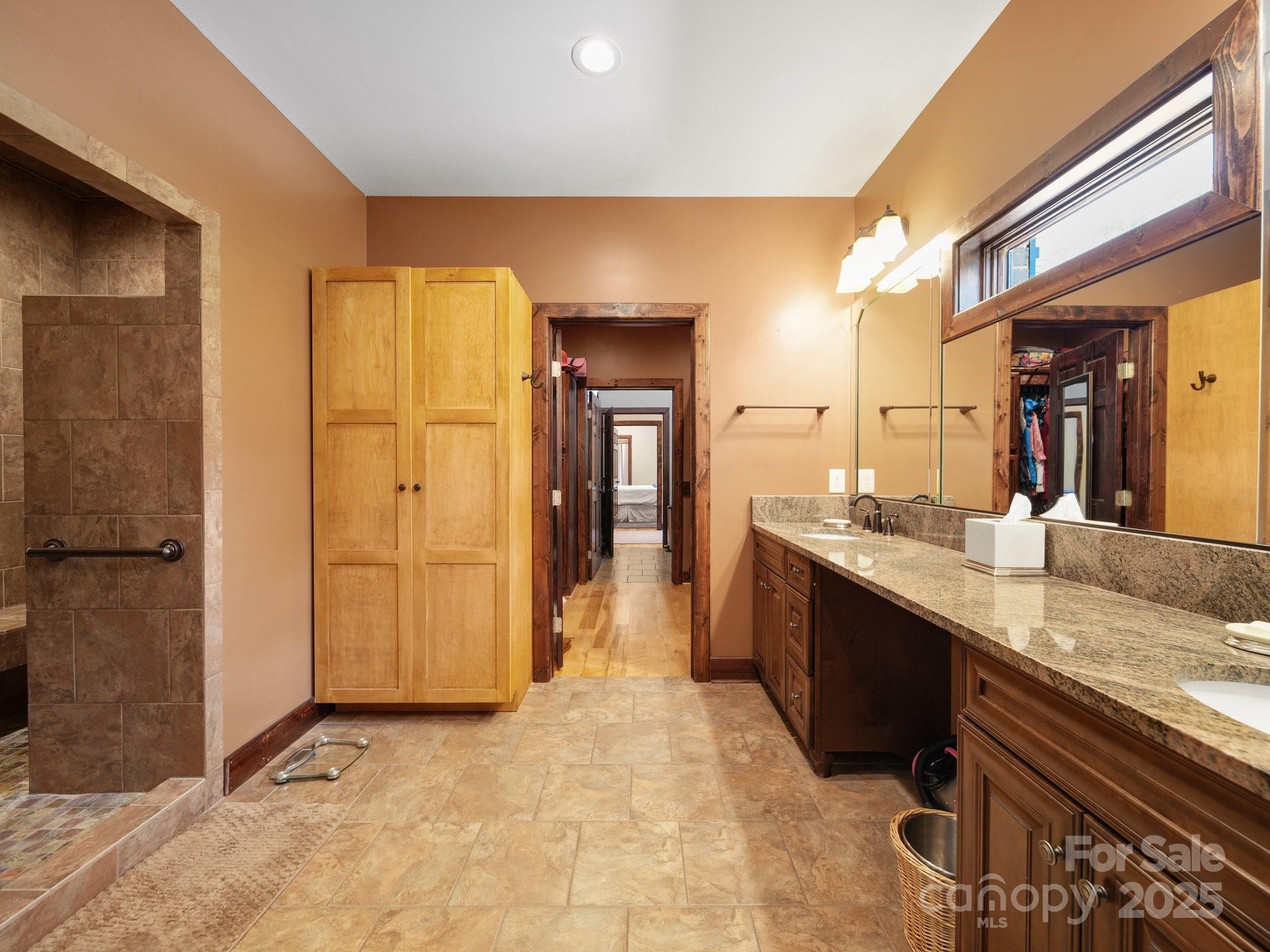 6153 Barclay Lane Clover, SC 29710 - Photo 12 of 27 a bathroom with a granite countertop sink and a mirror