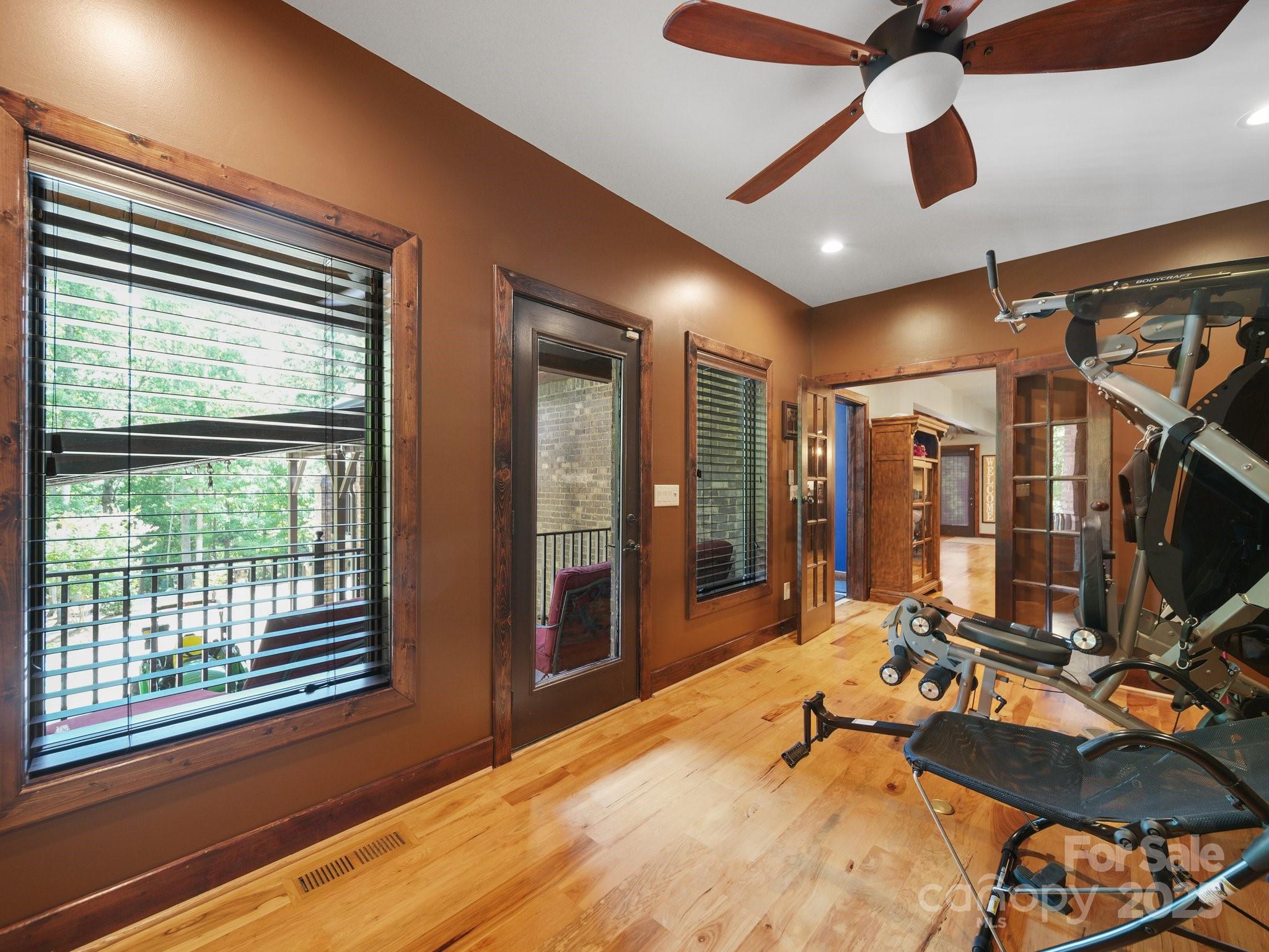 6153 Barclay Lane Clover, SC 29710 - Photo 14 of 27 a room with gym equipment and a large window