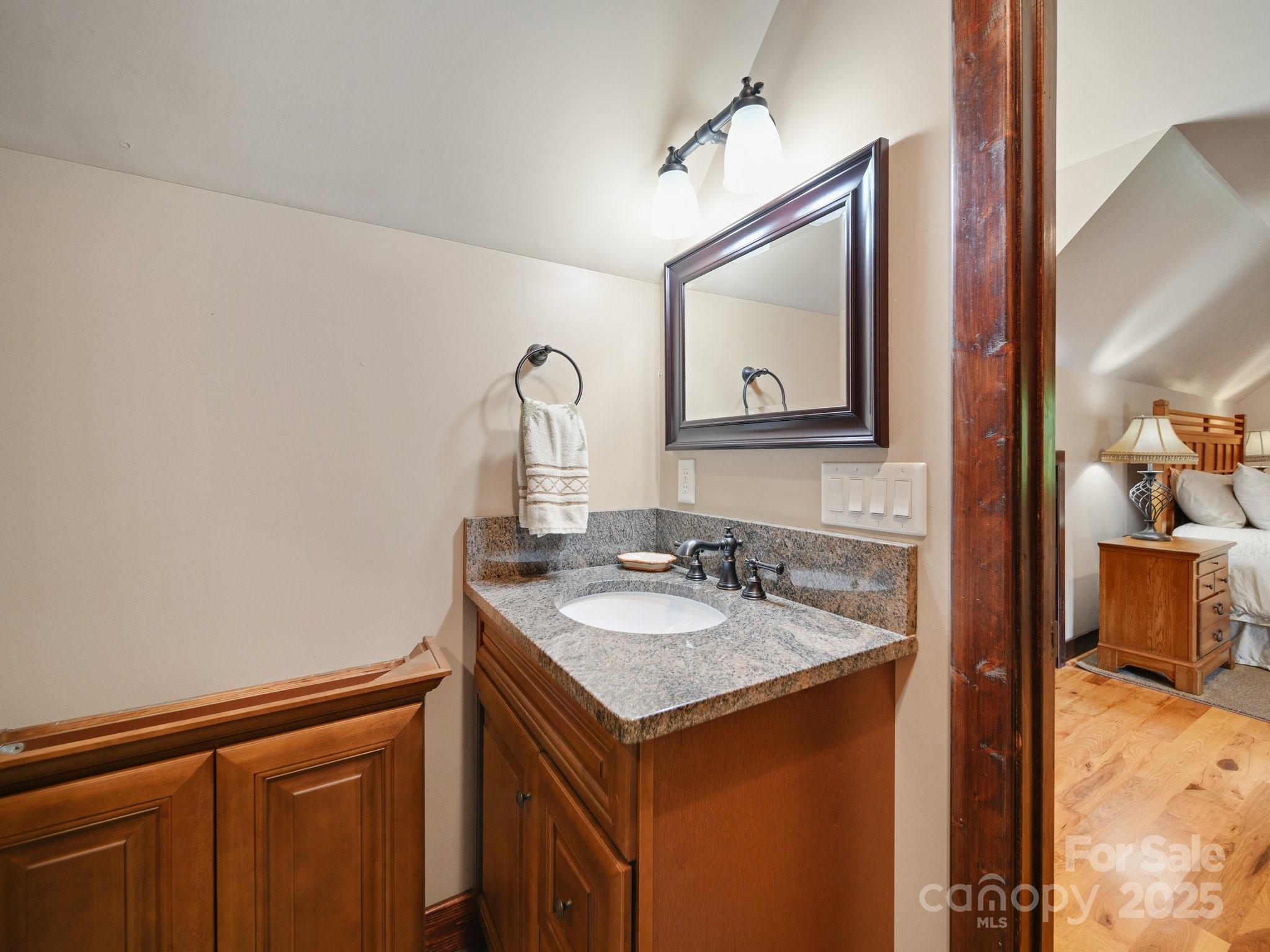 6153 Barclay Lane Clover, SC 29710 - Photo 17 of 27 a bathroom with a sink vanity and mirror