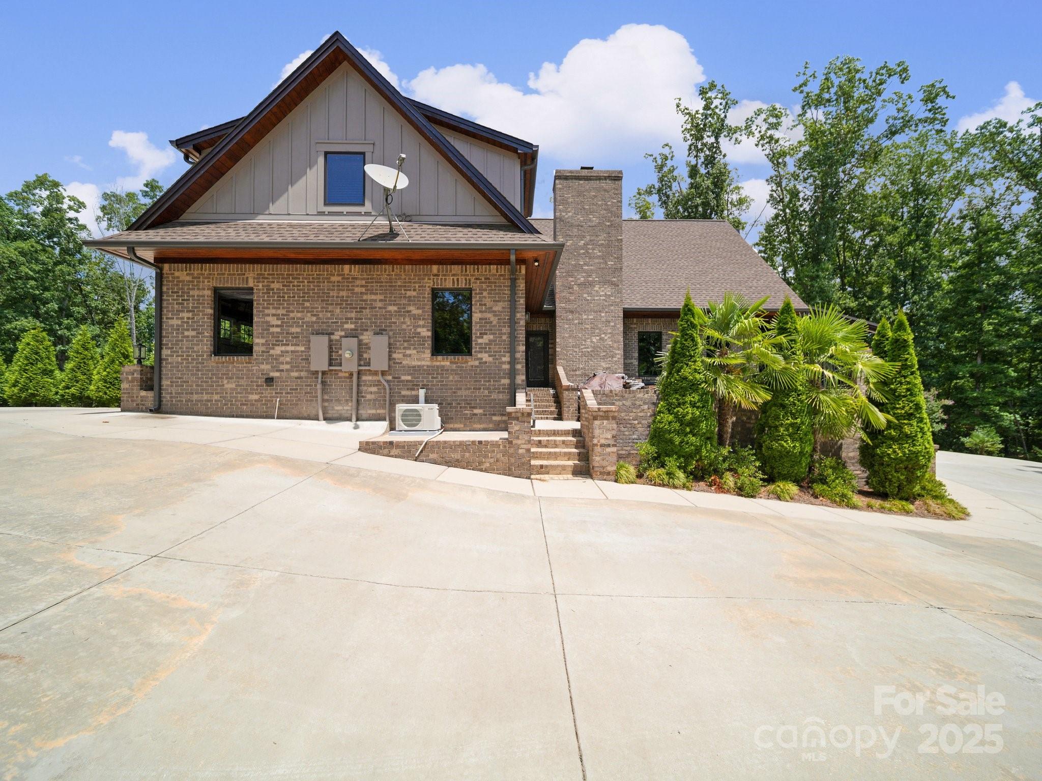 6153 Barclay Lane Clover, SC 29710 - Photo 24 of 27 a front view of a house with a yard and garage