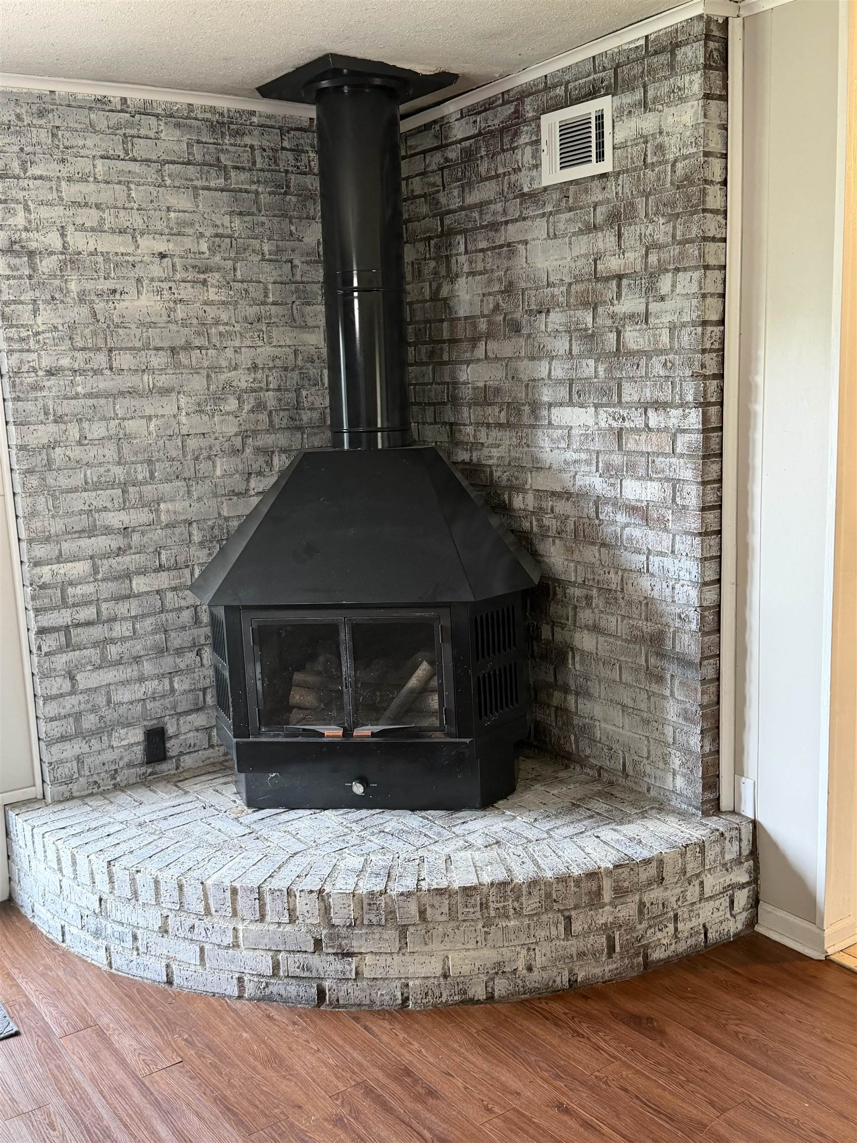 7919 Max Drive Millington, TN 38053 - Photo 5 of 13 a view of a fireplace with wooden floor
