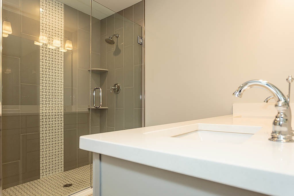 8 Cleveland Road, Unit A Winchester, MA 01890 - Photo 17 of 26 a bathroom with a sink and a mirror