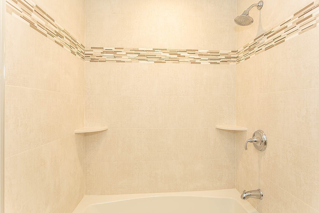 8 Cleveland Road, Unit A Winchester, MA 01890 - Photo 22 of 26 a bathroom with a shower