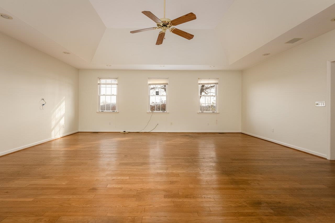 7664 Kiser Road Mount Crawford, VA 22841 - Photo 17 of 45 a view of an empty room with window and wooden floor