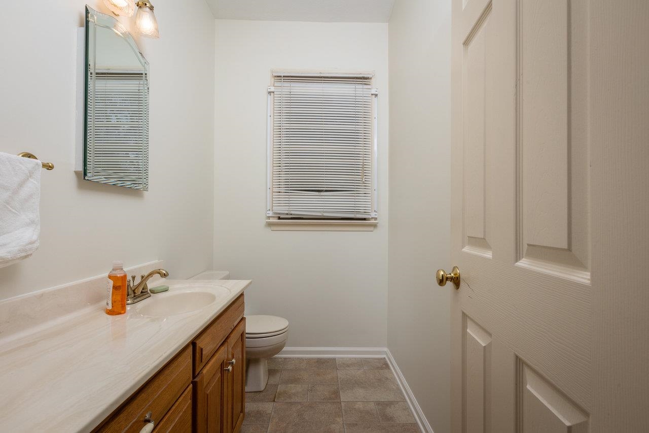 7664 Kiser Road Mount Crawford, VA 22841 - Photo 18 of 45 a bathroom with a sink toilet and vanity