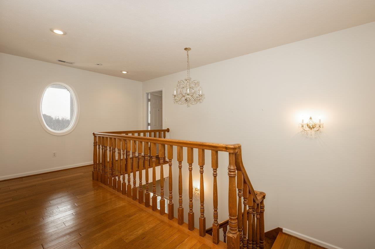 7664 Kiser Road Mount Crawford, VA 22841 - Photo 20 of 45 a view of a hallway with wooden floor and entryway