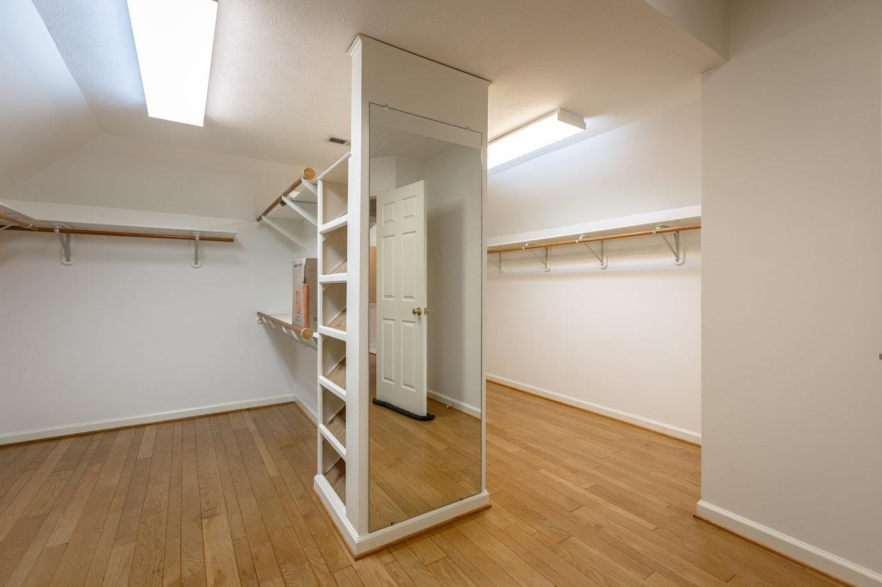7664 Kiser Road Mount Crawford, VA 22841 - Photo 26 of 45 a view of an empty room with wooden floor and a window