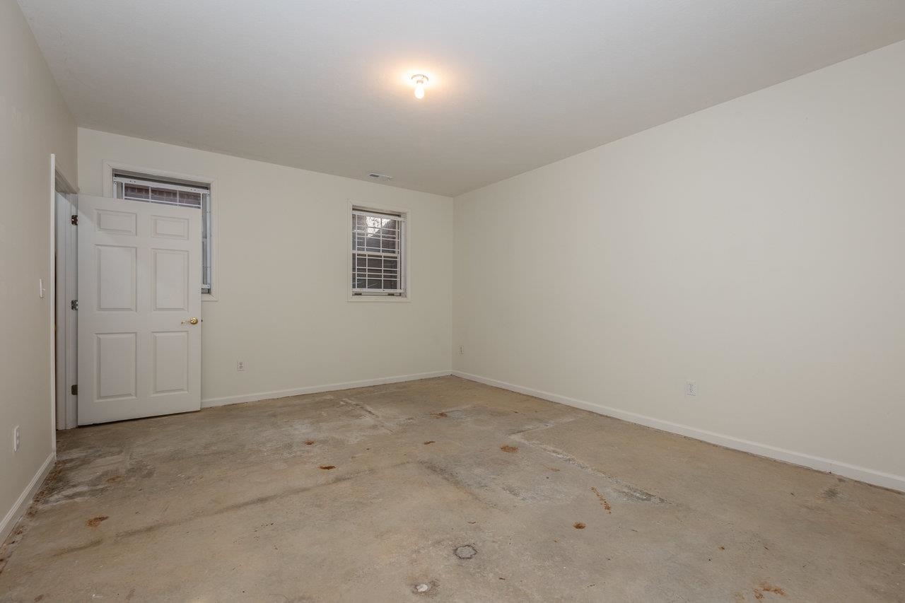 7664 Kiser Road Mount Crawford, VA 22841 - Photo 33 of 45 an empty room with a empty space and windows