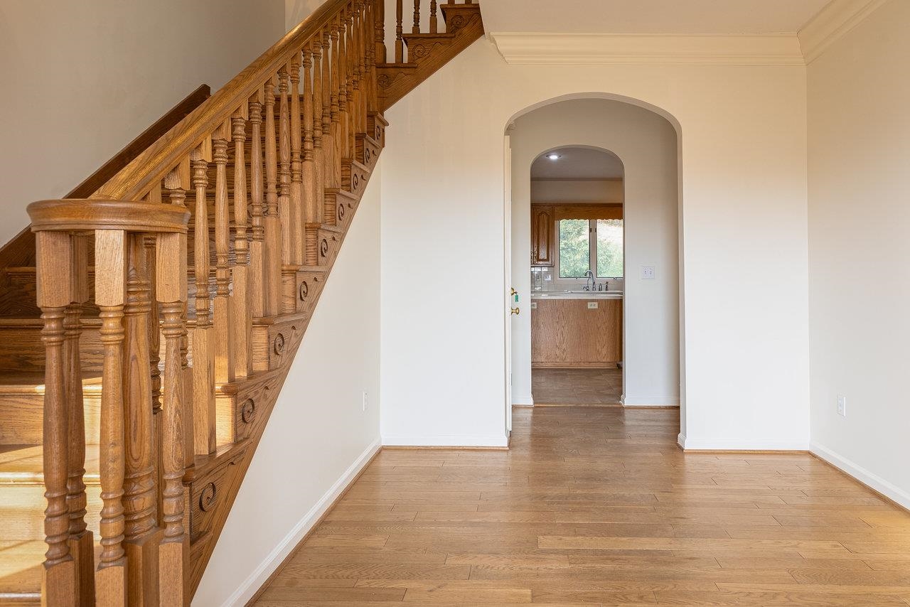 7664 Kiser Road Mount Crawford, VA 22841 - Photo 5 of 45 a view of a hallway with wooden floor and staircase