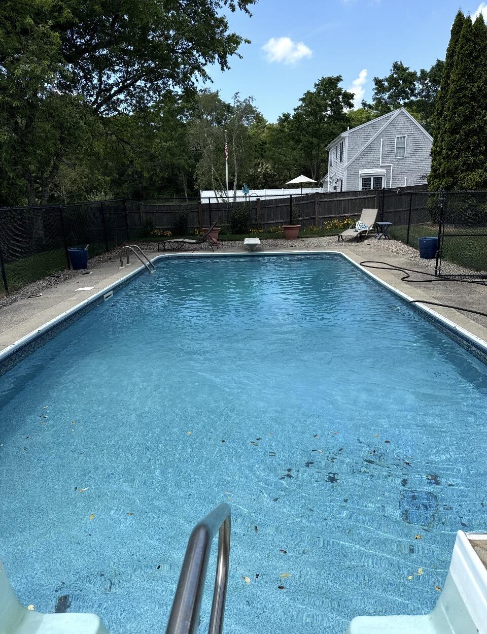 30 Sheffield Place Mashpee, MA 02649 - Photo 34 of 38 a view of a swimming pool with a patio