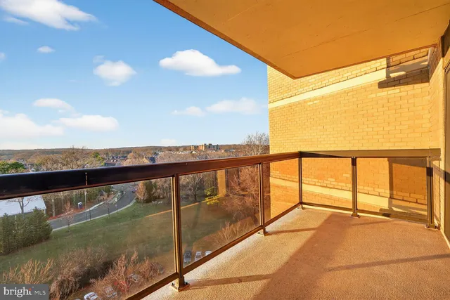 a view of balcony with furniture
