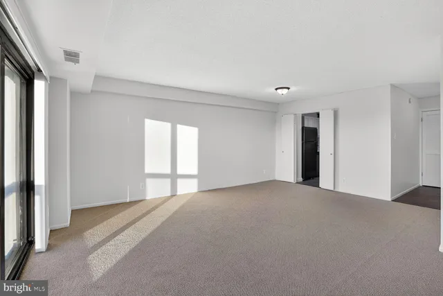 a view of a livingroom with a staircase