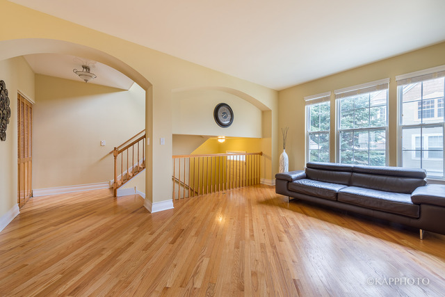 1270 Georgetown Way Vernon Hills, IL 60061 - Photo 13 of 25 a view of livingroom with furniture wooden floor and window